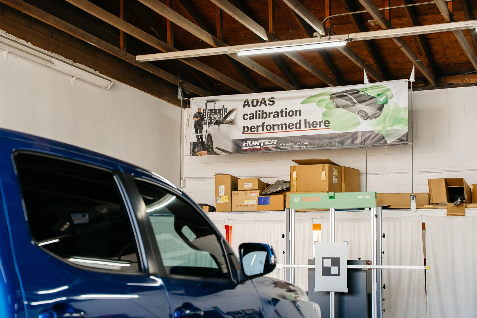 ADAS calibration performed on a pickup using the Bosch target system at Renewal Body Works